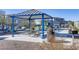 Community playground with picnic tables and colorful playground equipment at 1103 Tektite Ave, Henderson, NV 89011