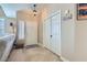 Bright foyer features tile flooring, closet, window and view of the living room at 1110 Legato Dr, Las Vegas, NV 89123