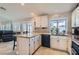 Bright kitchen features granite counters, stainless steel sink, and ample cabinet space at 1110 Legato Dr, Las Vegas, NV 89123