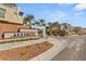 Welcoming community entrance with modern signage and manicured landscaping, showcasing a neighborhood at 11256 Rainbow Peak Ave # 207, Las Vegas, NV 89135