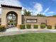 Welcoming community entrance featuring manicured landscaping and stone signage that reads Allegra at 12054 Portamento Ct, Las Vegas, NV 89138