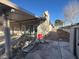 The exterior backyard shows a covered patio and the chimney at 1275 Westwind Rd, Las Vegas, NV 89146