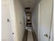 Hallway view that includes white doors and walls with evidence of electrical work at 1275 Westwind Rd, Las Vegas, NV 89146