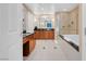 Bright bathroom featuring double vanities, a soaking tub and separate shower with modern tile work at 135 E Harmon Ave # 701, Las Vegas, NV 89109