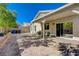 A covered patio provides shade and shelter from the sun in this backyard at 1421 Hometown Ave, Henderson, NV 89074