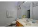 Bathroom featuring neutral countertop, single sink, and natural lighting at 1421 Hometown Ave, Henderson, NV 89074