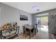 Dining room with a bar area and sliding doors to the backyard at 1421 Hometown Ave, Henderson, NV 89074