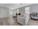 Inviting living room with soft gray walls, plush sectional, and stylish accents for comfortable living at 1421 Hometown Ave, Henderson, NV 89074