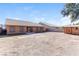 Large backyard featuring a block wall and storage shed at 144 La Mirada Dr, Henderson, NV 89015