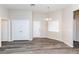 Bright dining area with neutral paint and vinyl plank flooring at 144 La Mirada Dr, Henderson, NV 89015