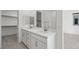 Bright bathroom with double sink vanity, quartz countertop, and modern hardware at 1479 Melodic Lark Dr, Las Vegas, NV 89138