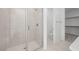 This bathroom features a glass-enclosed shower and access to a separate toilet room and walk-in closet at 1479 Melodic Lark Dr, Las Vegas, NV 89138