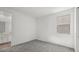 Bright bedroom with gray carpet and a window offering natural light at 1479 Melodic Lark Dr, Las Vegas, NV 89138