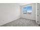 Carpeted bedroom with a view of nearby mountains at 1479 Melodic Lark Dr, Las Vegas, NV 89138