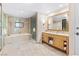 Luxurious bathroom with a soaking tub, double vanities, and marble finishes at 2000 N Fashion Show Dr # 2021, Las Vegas, NV 89109