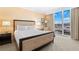 Bedroom with large bed and amazing city view at 2000 N Fashion Show Dr # 2021, Las Vegas, NV 89109