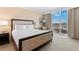 Cozy bedroom with a king-size bed, city views, and elegant decor at 2000 N Fashion Show Dr # 2021, Las Vegas, NV 89109