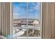 Incredible cityscape view from the bedroom's large windows with curtains at 2000 N Fashion Show Dr # 2021, Las Vegas, NV 89109