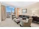 Bright living room with floor-to-ceiling windows and comfortable seating, featuring city views at 2000 N Fashion Show Dr # 2021, Las Vegas, NV 89109