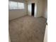 Bedroom showing ample natural light, neutral carpet, and closet at 2080 Karen Ave # 15, Las Vegas, NV 89169