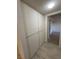 Hallway leading to bedroom with floor to ceiling storage at 2080 Karen Ave # 15, Las Vegas, NV 89169