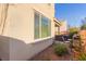 Landscaped backyard area with shrubs and brick pavers at 2149 Morro Vista Dr, Las Vegas, NV 89135