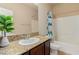 Bathroom featuring a tiled floor, vanity, granite countertops, and a shower with tub combo at 2149 Morro Vista Dr, Las Vegas, NV 89135