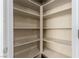 Walk-in pantry featuring adjustable shelving for optimal storage and organization at 2149 Morro Vista Dr, Las Vegas, NV 89135