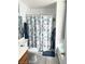 Charming bathroom featuring an aquatic-themed shower curtain and matching decor at 2240 Highpointe Dr # 201, Laughlin, NV 89029