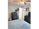 A bedroom with gray walls, ceiling fan, and full furnishings at 2240 Highpointe Dr # 201, Laughlin, NV 89029