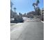 Gated entrance to community with palm trees and street lights at 2240 Highpointe Dr # 201, Laughlin, NV 89029