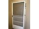 Apartment front door with screen door and unit number in a neutral exterior at 2240 Highpointe Dr # 201, Laughlin, NV 89029