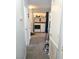 Hallway view of laundry room with modern washer and dryer and ample storage space at 2240 Highpointe Dr # 201, Laughlin, NV 89029