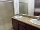 Bathroom featuring a granite countertop and double sinks at 27 E Agate Ave # 303, Las Vegas, NV 89123