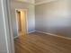 Bright bedroom with wood flooring and neutral paint color at 27 E Agate Ave # 303, Las Vegas, NV 89123