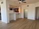 Bright open floor plan living area with light-colored floors and white walls at 27 E Agate Ave # 303, Las Vegas, NV 89123