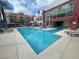 Outdoor swimming pool with sun loungers and modern design at 27 E Agate Ave # 303, Las Vegas, NV 89123