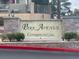 Park Avenue Condominiums building sign with brick accents and lush green landscaping at 27 E Agate Ave # 303, Las Vegas, NV 89123