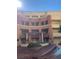 Attractive building exterior featuring a fountain, balconies, covered entries and landscaped grounds at 270 E Flamingo Rd # 433, Las Vegas, NV 89169