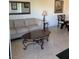 Living room featuring tile floors, a couch, a table and chairs, and decor at 270 E Flamingo Rd # 433, Las Vegas, NV 89169