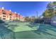 Well-maintained tennis court surrounded by greenery and apartment buildings, perfect for recreation at 270 E Flamingo Rd # 433, Las Vegas, NV 89169