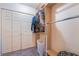 Well-organized closet with built-in shelving and ample space for clothing storage at 2967 Pinehurst Dr, Las Vegas, NV 89109