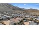 Panoramic aerial shot showing the neighborhood's layout and proximity to the nearby mountains at 3018 Fall Solstice Ct, Las Vegas, NV 89138