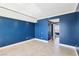 Cozy bedroom with tile floors, recessed lighting, and a serene ambiance with blue walls at 322 Karen Ave # 2501, Las Vegas, NV 89109