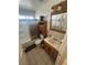 Bathroom with tile flooring, vanity with mirror, and a shower/tub combo at 3230 Cameron St # A, Las Vegas, NV 89102