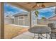 Backyard with shed, patio, and gravel at 3334 Flying Colt Ct, North Las Vegas, NV 89032