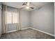 Bedroom featuring a ceiling fan, neutral walls, and carpeted flooring at 3334 Flying Colt Ct, North Las Vegas, NV 89032