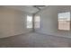 Spacious bedroom featuring carpeting, a ceiling fan and natural light from the window at 3640 Chateau Meadow St, Las Vegas, NV 89129