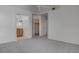 Bedroom leading to en suite bathroom, featuring neutral walls and carpeting at 3640 Chateau Meadow St, Las Vegas, NV 89129