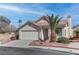 Charming single-story home featuring a two-car garage, desert landscaping, and a welcoming front porch at 3640 Chateau Meadow St, Las Vegas, NV 89129